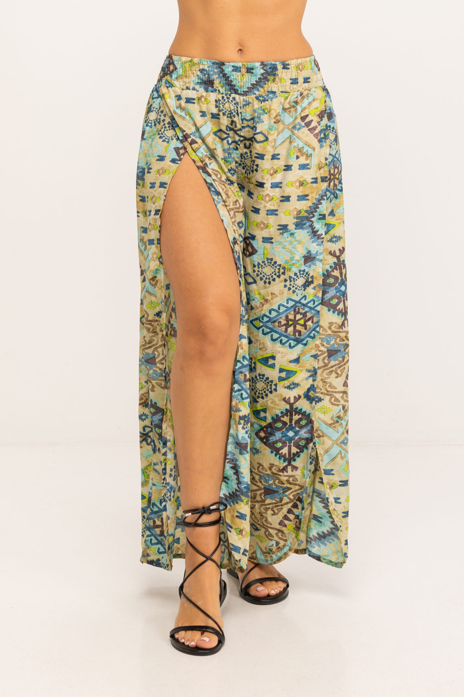 PANTALON LARGO ESTAMPADO CON CINTURA ELASTICA ANCHA, PERNERAS ABIERTAS DESDE LA RODILLA