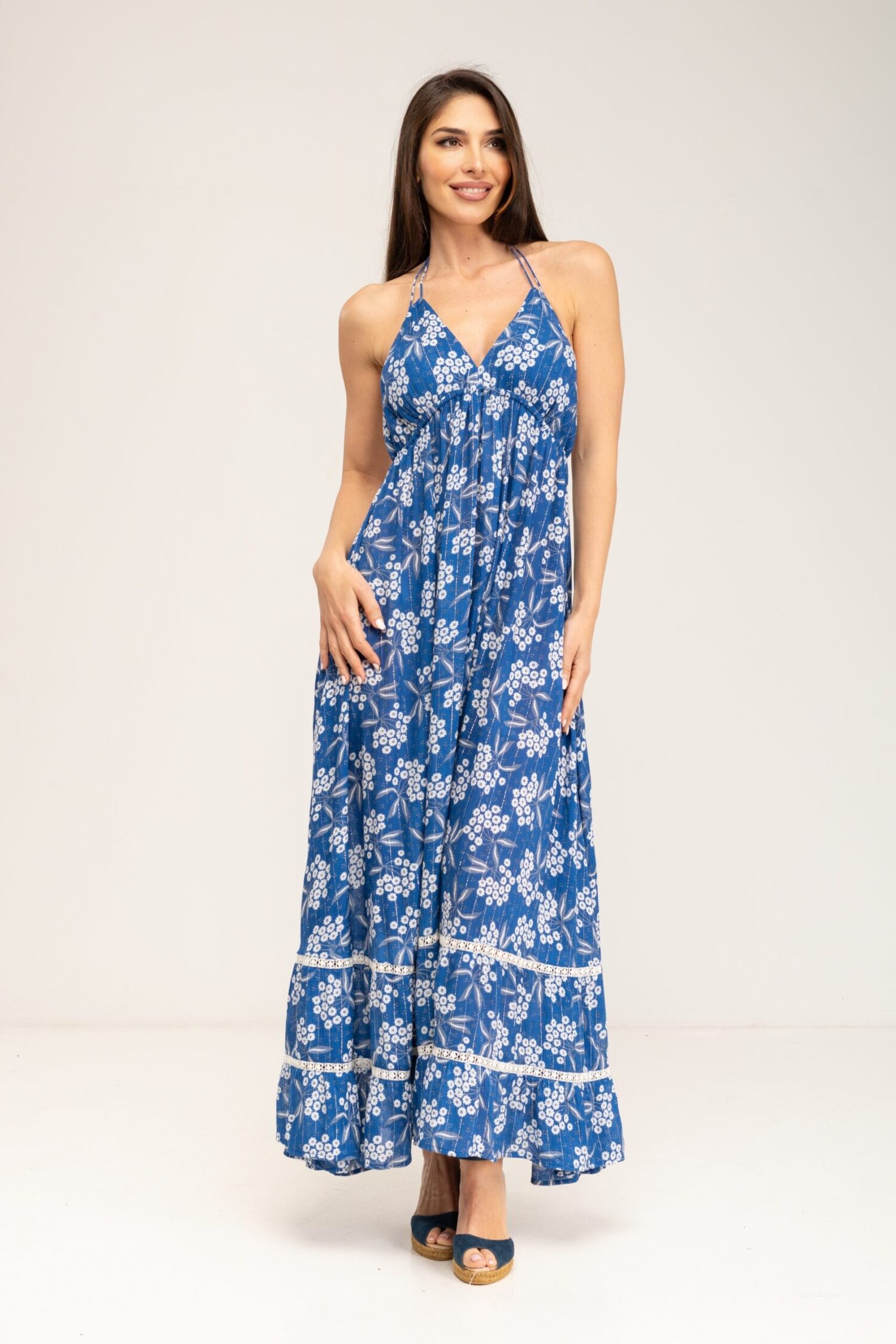 VESTIDO ESTAMPADO SIN MANGAS CUELLO EN V ESPALDA ABIERTA Y CENEFAS