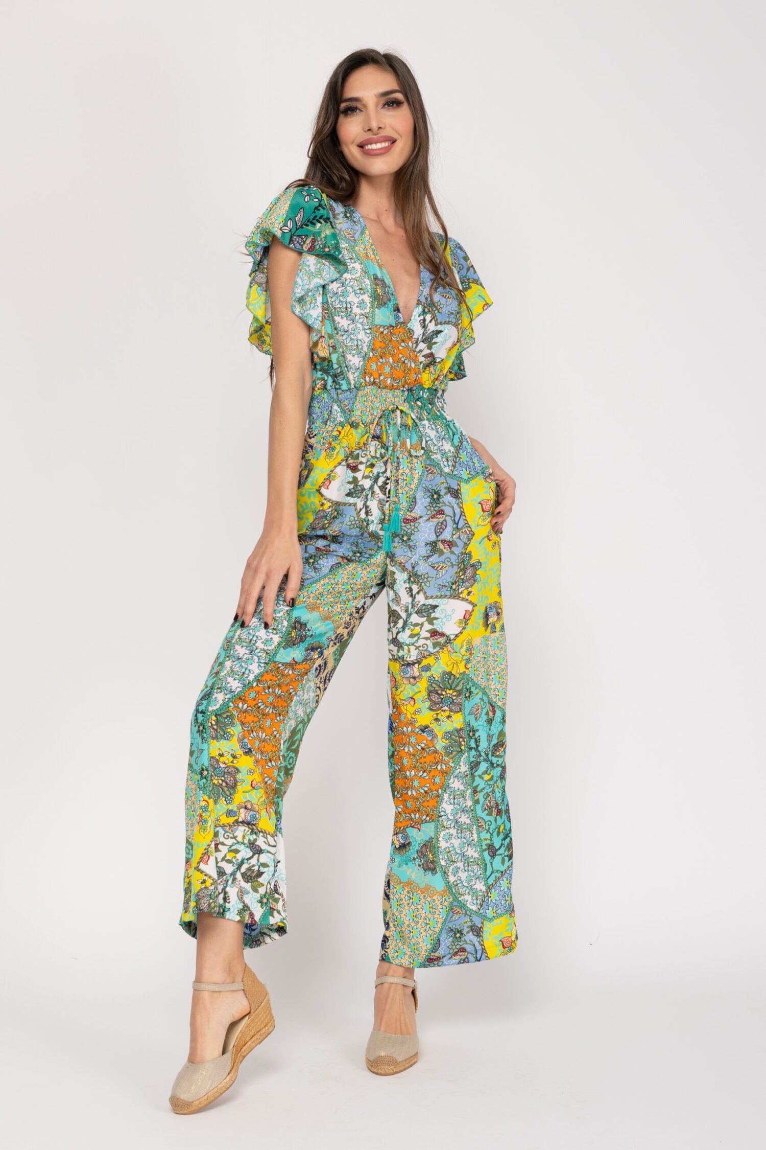 PETO ESTAMPADO CON ESCOTE CRUZADO Y CINTURILLA  ELASTICA